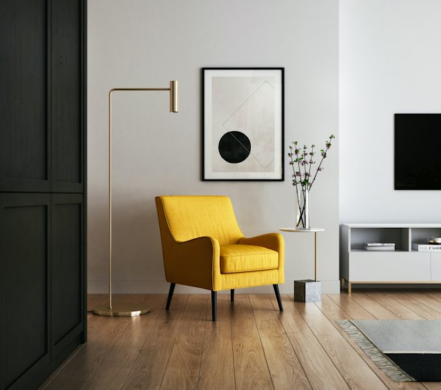 Living room with a sofa, rug, and floor space