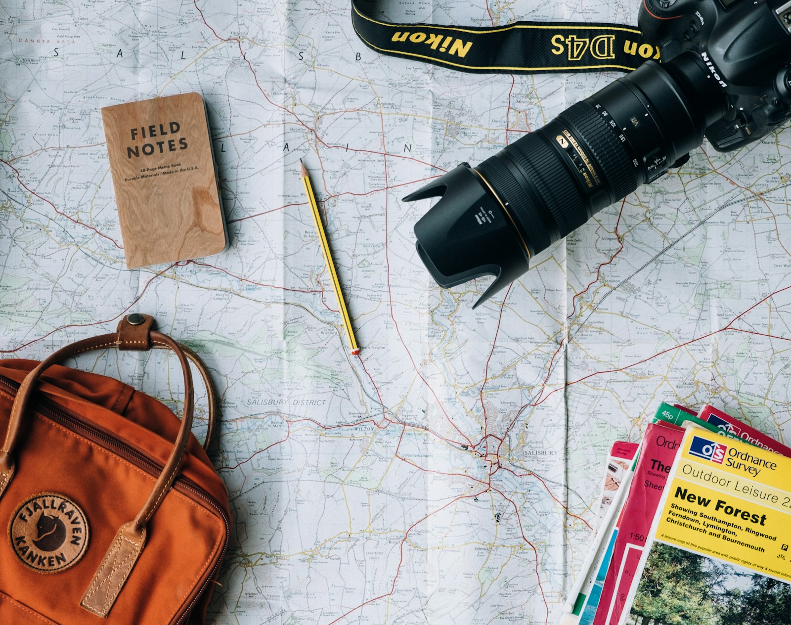 Travel planning materials arranged before a trip